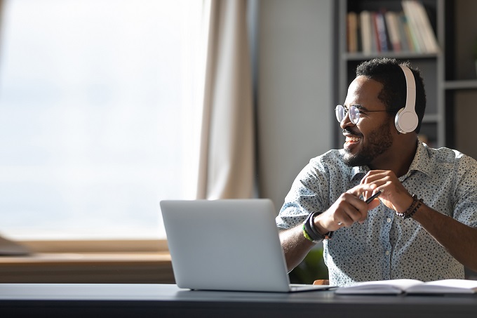 Man listening to computer 