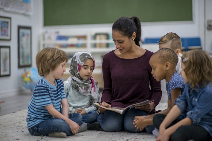 Teacher reading to students