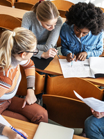 Young college students review classwork
