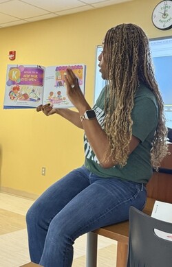 Cheron H. Davis leading a read-aloud Cheron H. Davis leading a read-aloud